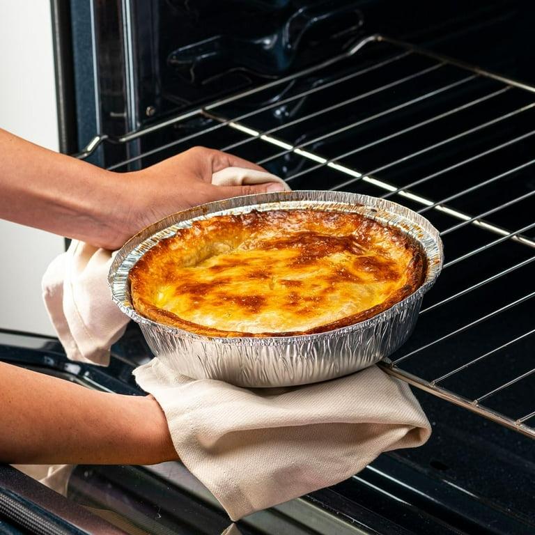 Recalentando un quiche en horno protegido con papel aluminio.